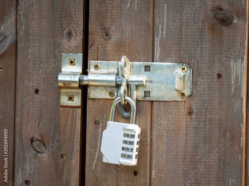 wooden timber storage shed with stainless steel security combination lock