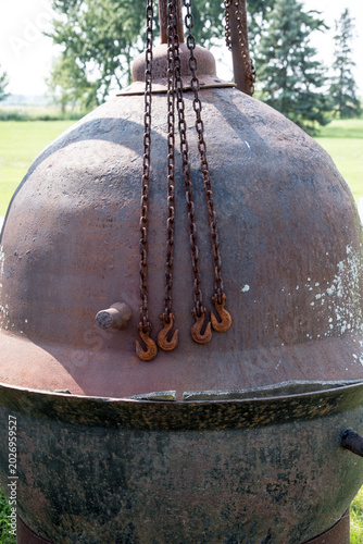 Old rusted metal hook and chain