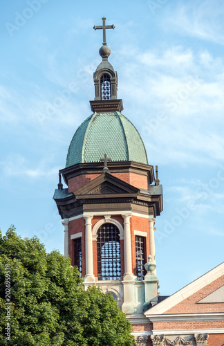 A cross on top of a church tower