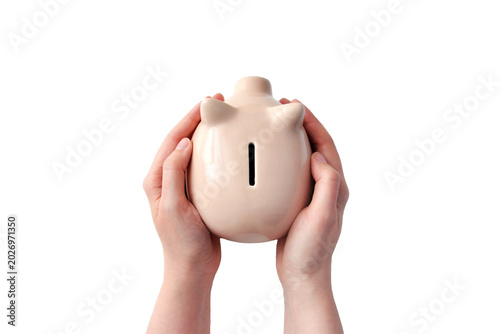 Piggy bank in hands isolated on white background, savings concept
