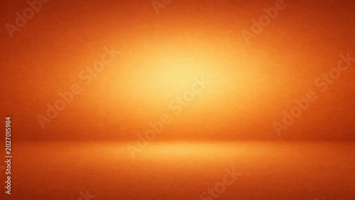 Orange gradient background with studio lighting effect