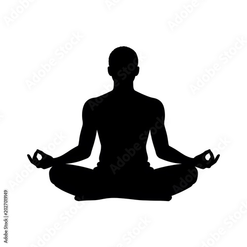 Silhouette of young woman meditating in yoga lotus pose for relaxation and inner peace