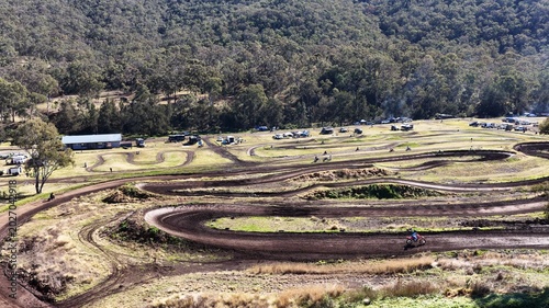 Schilderij op canvas Aerial View of a Winding Dirt Motocross Track in Rural Australia