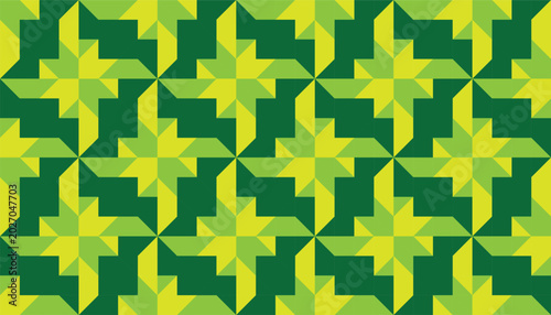 Abstract star and pinwheel geometric seamless pattern. Modern vector texture background in green and yellow colors for wallpaper, fabric, and graphic print.