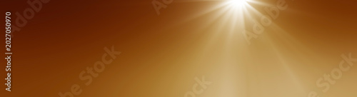abstract photo of light burst among trees and glitter bokeh. image is blurred. yellow blue bokeh pattern background. Real optical lens flare on black backdrop. sunrays, sun rays beam, burst, sunbeam