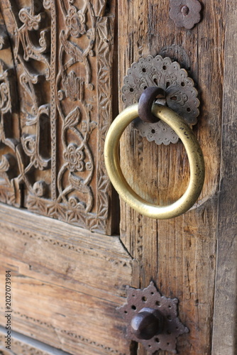An antique wooden carved door in Uzbekistan
