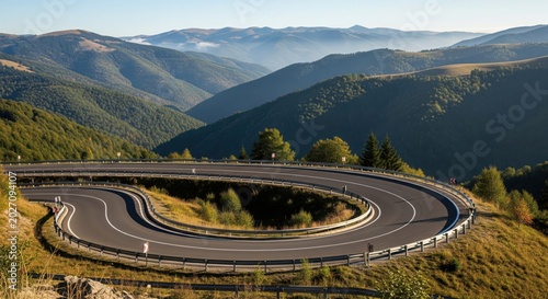 Scenic Hairpin Curve on Winding Mountain Road at Sunrise
