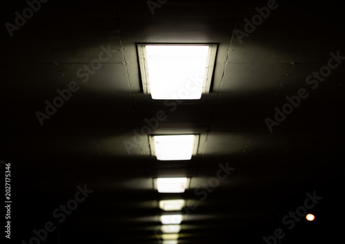 Ceiling lights in dark interior - Toronto, Ontario, Canada