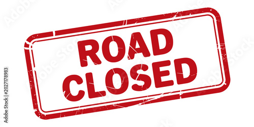 Road closed sign with red border and text on white