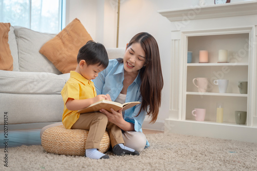 Joyful Mother-Son Reading Moments at Home