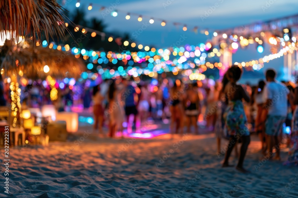 Obraz premium Beach party blurred background. Group of people on the tropical beach having a party on summer vacation