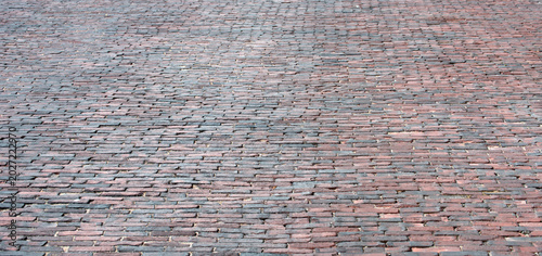 Принти на полотні Brick pavement texture shows urban character
