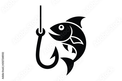 Black and white fish hooked on a fishing hook