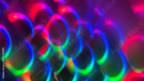 Photos A mesmerizing pattern of glowing neon circles in blue, green, red and purple hue