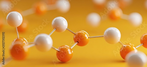 Abstract molecular chain of alternating white and orange spheres on yellow
