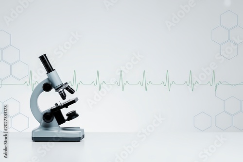 Medical microscope on white table in laboratory setting