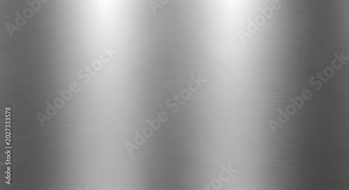 Brushed silver metal texture with bright spotlight reflections