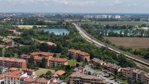 Aerial View of a Suburban Landscape with Train Tracks. Poasco, Milan, Italy.