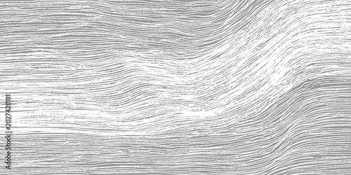 Abstract grey and white wavy lines texture resembling wood grain or water ripples