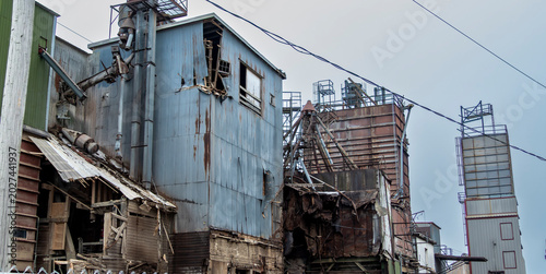 Konstfotografi Buildings at an abandoned industrial site stand in disrepair