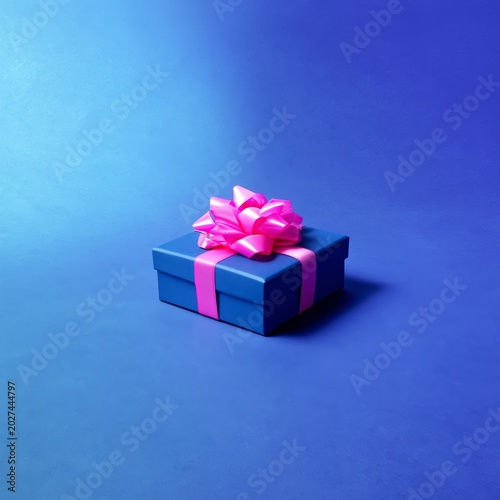 Bright Blue Gift Box With Pink Ribbon and Bow on a Smooth Surface in Soft Lig...