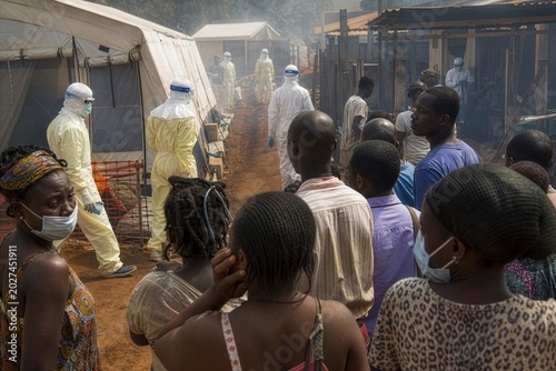 Ebola virus crisis unfolds as medical teams enter an affected community