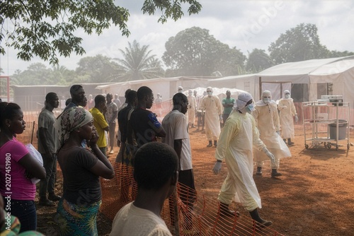 Vigilant eyes watch as frontline workers confront the Ebola virus crisis