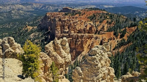  View from the rim of Bryce Canyon looking over the vast geological vista with tilt up to far distant valley