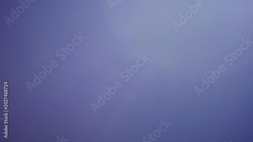 Violet-tinted leak overlay with edge glow, producing a soft veiling flare effect for transitions or highlights