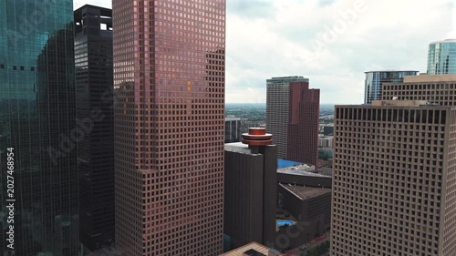 Drone flight through Houston Texas financial district between skyscrapers
