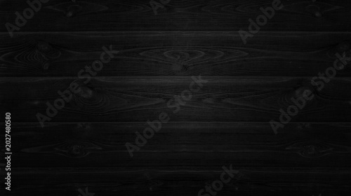 Black wood texture background with natural pattern