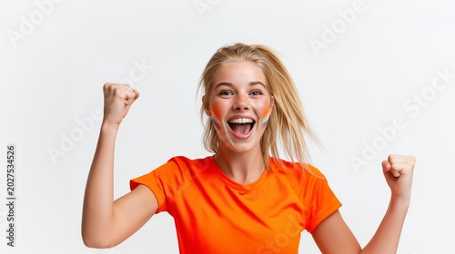 Excited Netherlands football fan cheering in orange shirt
