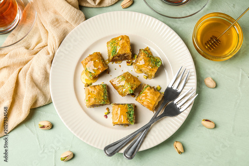 Plate with tasty baklava on...