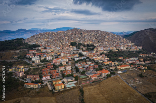 Sunset view of the rooftops of Gangi . Sicily, Italy. August 2024. Aerial drone picture.