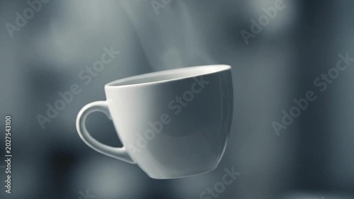 A white coffee cup with steam rising.