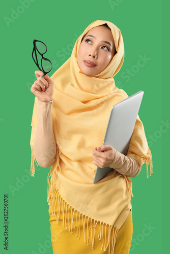Beautiful Muslim woman with...