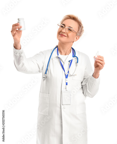 Mature female doctor with d...