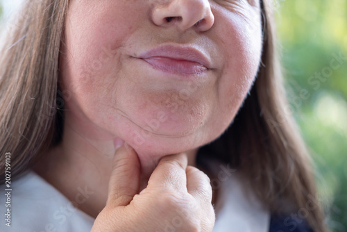 Foto closeup face mature woman 55 years old, human fat neck, double saggy chin, Aging