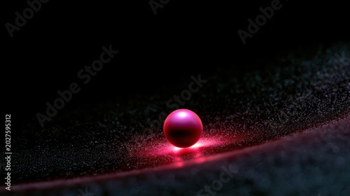 Dark matte black Christmas flat lay with neon pink bauble and soft glow