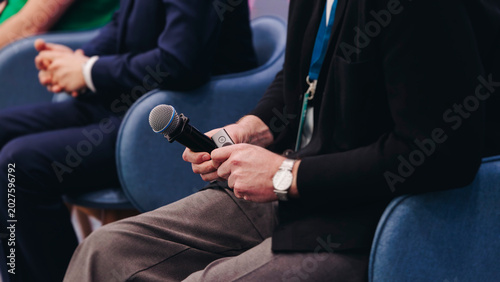 Photos Panel discussion at conference, group of speakers debate at the business confere