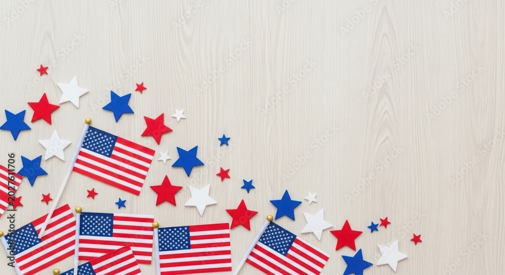 Obraz premium Colorful miniature American flags with stars scattered on light wooden surface background