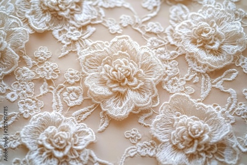 delicate ivory floral lace embroidery with raised textured blooms evoking romantic elegance