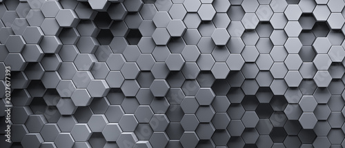 Smooth gray honeycomb background of patterned hexagons. Array of 3d rendered hex shapes creating a visual of a sleek, silver, metallic, pattern for futuristic, scientific, or technical backgrounds.