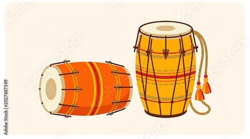 Two traditional indian dhol drums, one lying horizontally and one standing vertically with a rope cord