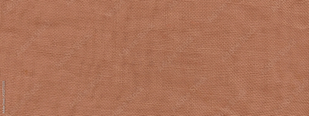Fototapeta premium Terracotta linen fabric texture, rustic orange textile background, close-up of woven natural cotton material for interior design and fashion