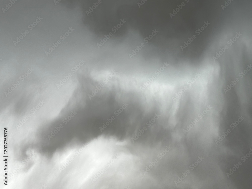 Fototapeta premium Rain storm clouds creating dramatic natural weather scene across open atmospheric sky