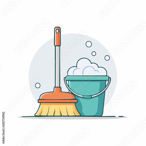 Broom and bucket with soap bubbles