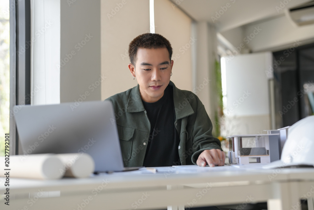 Fototapeta premium Architecture Man drawing on architectural Creative project business architecture building construction&nbsp;Industrial engineering Achievement Planning Design on laptop