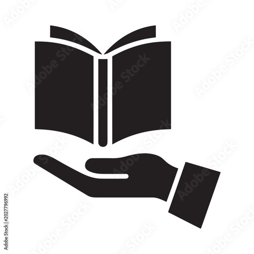 Tableau sur toile open book in hand silhouette against white background