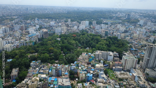 The aerial view of Chattogram city highlights the rapid urban expansion surrounding its remaining green hills and forests. Unplanned construction, hill cutting, and the destruction of trees.